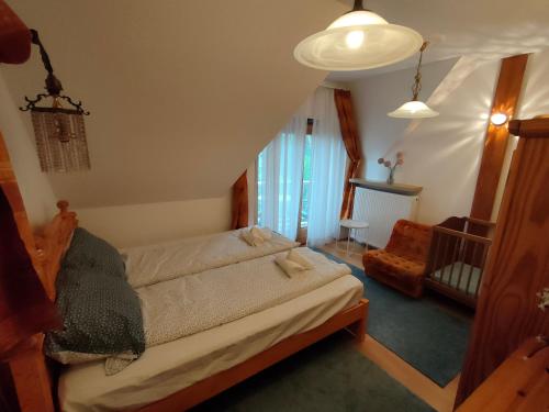 Posteľ alebo postele v izbe v ubytovaní Three Family Apartments
