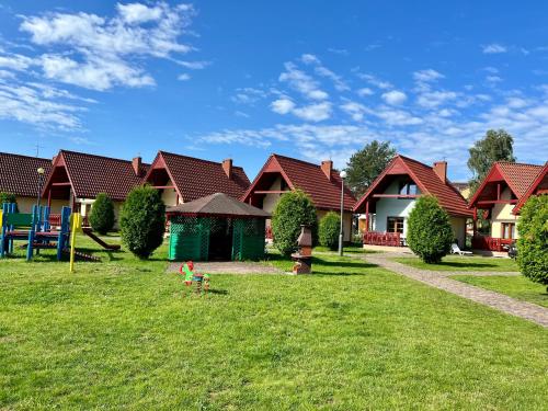 Fotografie z fotogalerie ubytování Lazur domki wypoczynkowe v destinaci Dźwirzyno