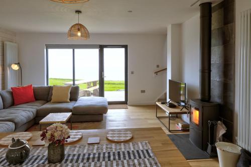 Posezení v ubytování Cottage 17 - 3 Bed