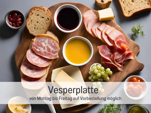 a cutting board with different types of meats and cheese at Gut Weihersmühle in Leutershausen