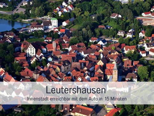an aerial view of a town with houses at Gut Weihersmühle in Leutershausen