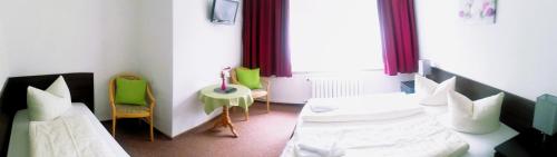 Ferienhotel Zwotatalにあるベッド