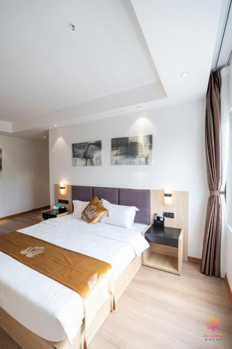 Postel nebo postele na pokoji v ubytování Hotel Miamor