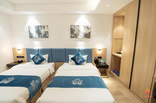 Postel nebo postele na pokoji v ubytování Hotel Miamor