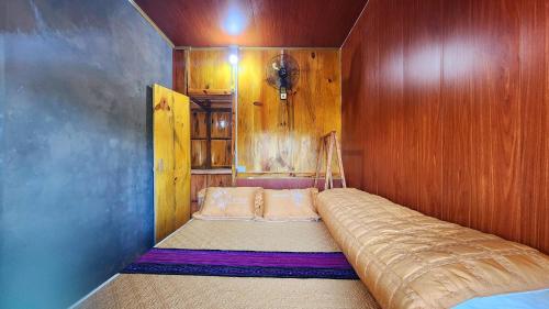Postel nebo postele na pokoji v ubytování Nature Homestay Mù Cang Chải