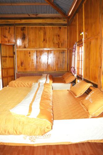 Postel nebo postele na pokoji v ubytování Nature Homestay Mù Cang Chải