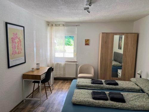 Postel nebo postele na pokoji v ubytování Famielienapartment An der Forellenschänke