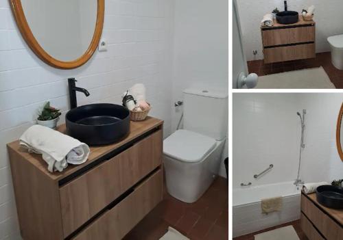 a bathroom with a sink and a toilet and a mirror at Casa Cerca del Aeropuerto y del Jarama in Santo Domingo