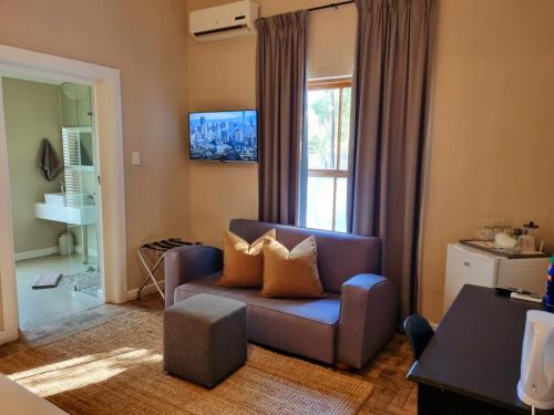 Μια τηλεόραση ή/και κέντρο ψυχαγωγίας στο The Merino Guest House