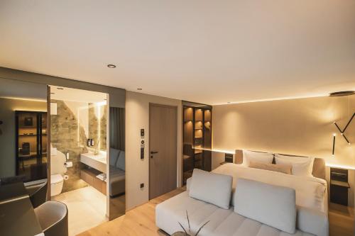 Ένα ή περισσότερα κρεβάτια σε δωμάτιο στο Hotel Lanerhof active/spa/balance