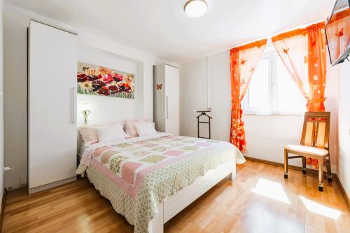 Postel nebo postele na pokoji v ubytování Uvala Apartment