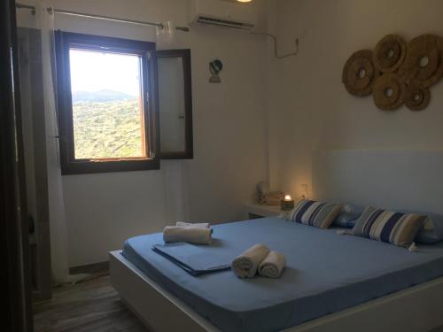 Postel nebo postele na pokoji v ubytování VILLA LEMONIA