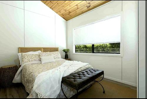 Una cama o camas en una habitación de Ultimate Mount Location