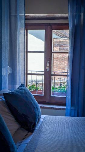Una cama o camas en una habitación de Pienzalettings "Suites"