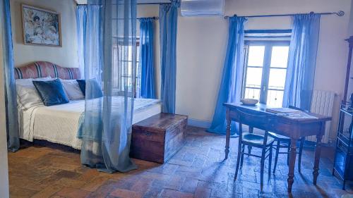 Una cama o camas en una habitación de Pienzalettings "Suites"