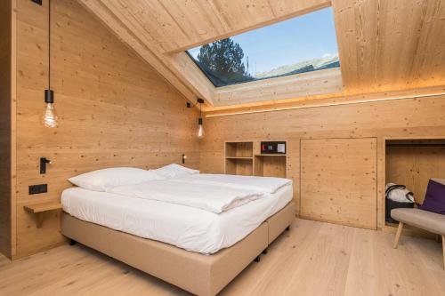 Hotel Bella Vista Zermattにあるベッド