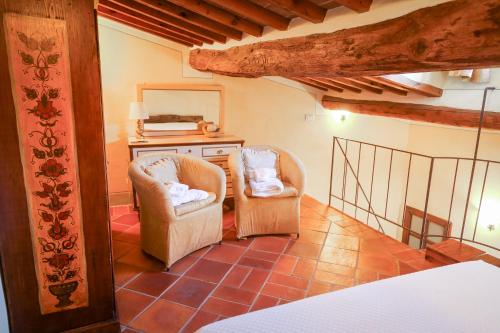 Una cama o camas en una habitación de Pienzalettings "Suites"