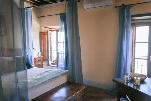 Una cama o camas en una habitación de Pienzalettings "Suites"