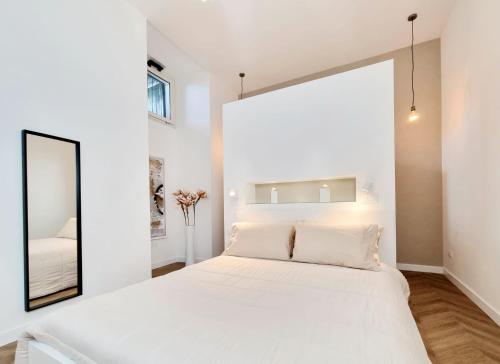 Кровать или кровати в номере Glamour Suite Cagliari