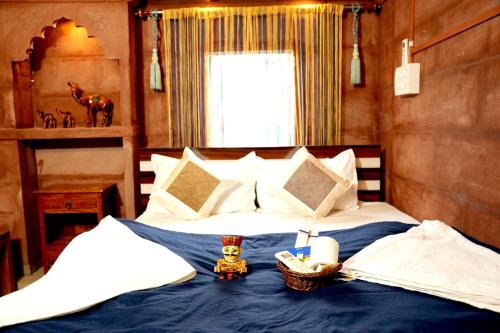 Una cama o camas en una habitación de MH Guest House