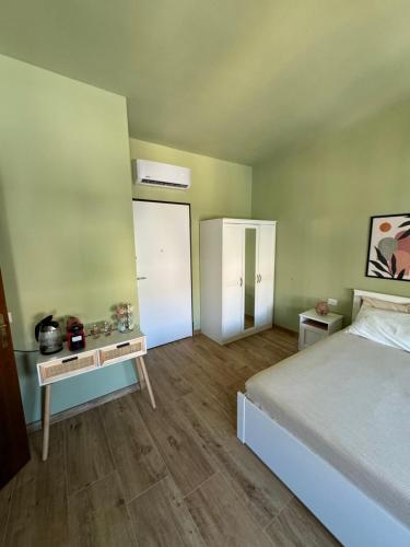 Postel nebo postele na pokoji v ubytování The Green Room