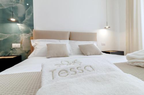 Postel nebo postele na pokoji v ubytování Tessa B&B
