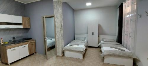Postel nebo postele na pokoji v ubytování Apartman SPLENDID