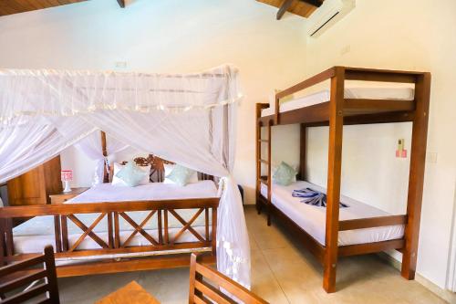 Ένα ή περισσότερα κρεβάτια σε δωμάτιο στο Chill Bay Weligama