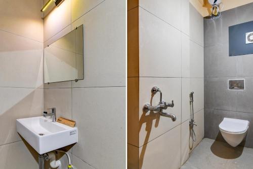 a bathroom with a sink and a toilet at Super Townhouse OAK Bulbuli Neer in Kolkata