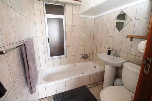 Koupelna v ubytování Uvongo Cabanas 1B