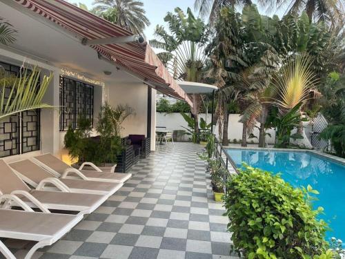 Πισίνα στο ή κοντά στο Maison d'hôtes villa Anna Dakar