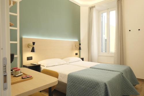 Voodi või voodid majutusasutuse My Maison Italy GuestHouse toas