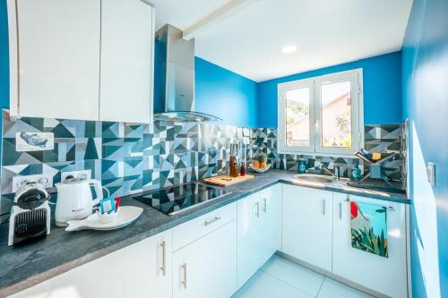 Кухня или мини-кухня в Maison Océan pour 2 personnes à Saint Joseph
