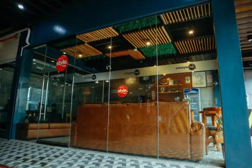 a restaurant with a stop signs in the window at Citistyle Inn in Davao City