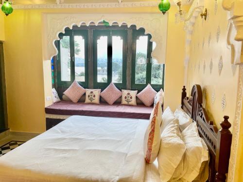 Cama o camas de una habitación en Sheeshmahal By Oladar