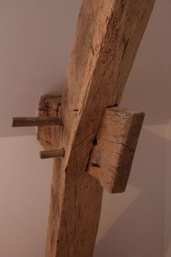 a cross made out of pieces of wood at Amazing renovated Loire Valley gite in La Pellerine