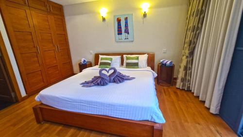 Postel nebo postele na pokoji v ubytování Icandi Hideaway