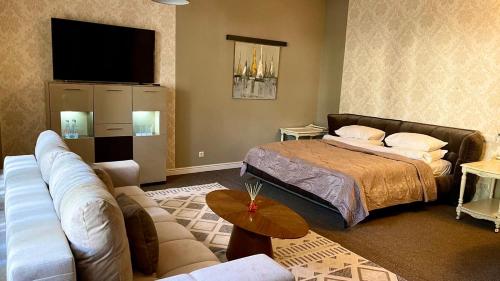 Postel nebo postele na pokoji v ubytování Villa-Sofia Mini-hotel