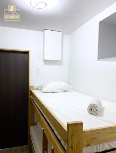 LE SAOMA, studio cabine, parking privé, climatisation