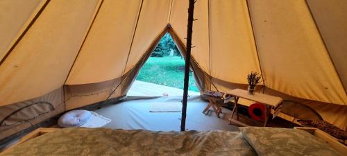Llit o llits en una habitació de Secret Garden Camping