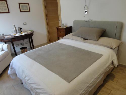 Postel nebo postele na pokoji v ubytování Nerone's - Sutri Bed & Dinner