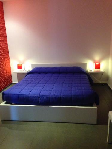 Ένα ή περισσότερα κρεβάτια σε δωμάτιο στο B&B Numero Uno