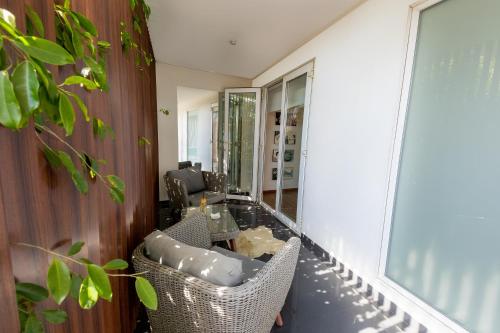 Posezení v ubytování Cosmopolitano Hotel Boutique