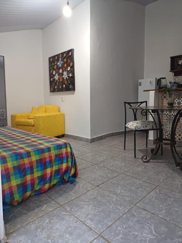 Ένα ή περισσότερα κρεβάτια σε δωμάτιο στο Casa Bem-te-vi