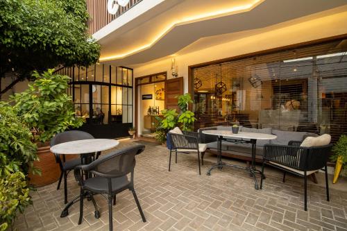 Posezení v ubytování Cosmopolitano Hotel Boutique