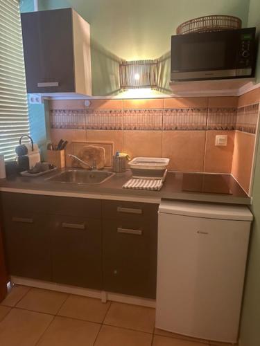 Una cocina o cocineta en Studio Ti Coco