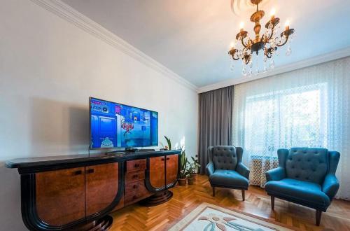 TV a/nebo společenská místnost v ubytování Hotel Liza
