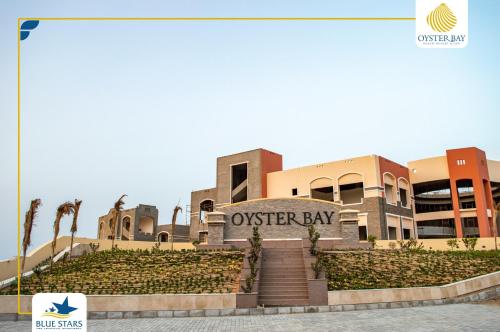 a view of the exterior of the oxeray building at Oyster bay Suite 01 in Abu Dabab