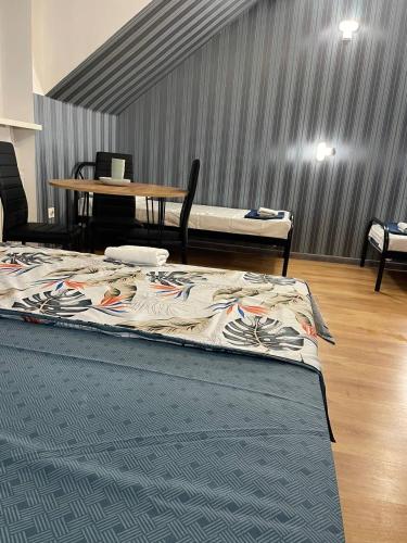Postel nebo postele na pokoji v ubytování VIP hotel