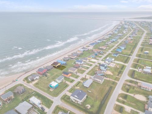 an aerial view of a beach with houses at Amazing Oceanfront 2BR Home Cozy Peaceful and Kid and Pet Friendly in Freeport